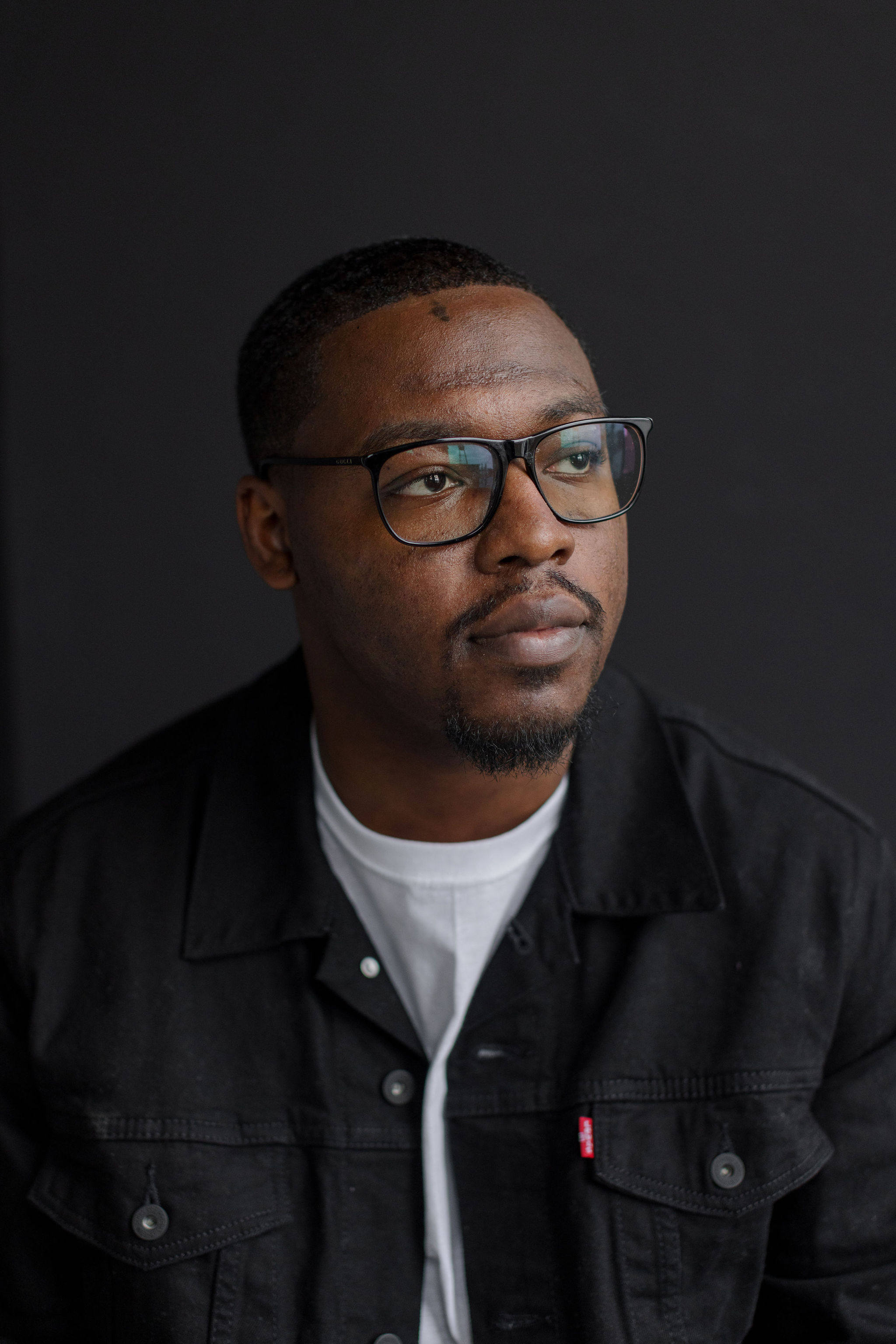 O. Arowolaju Professional Headshot - Side View